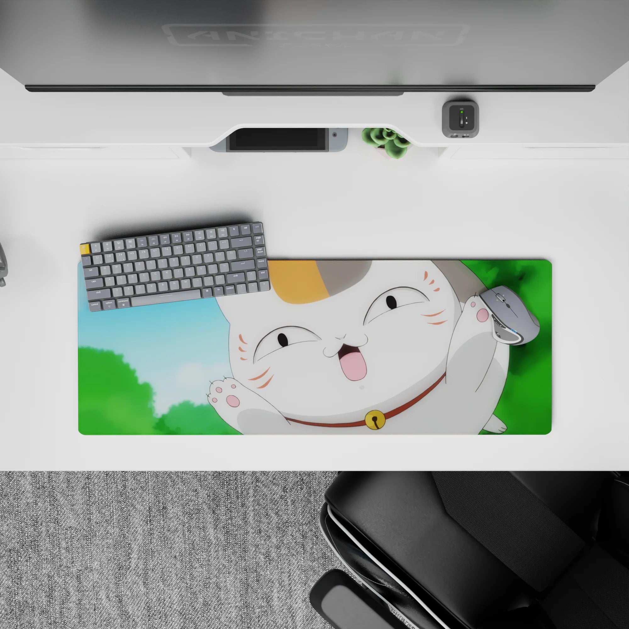 Bright blue and green anime mouse pad 32x12 inches with a playful smiling cat and warm orange patches.