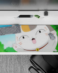 36x16 inches anime desk pad in bright blue, white and orange with blush cheeks, cheerful playful vibe.