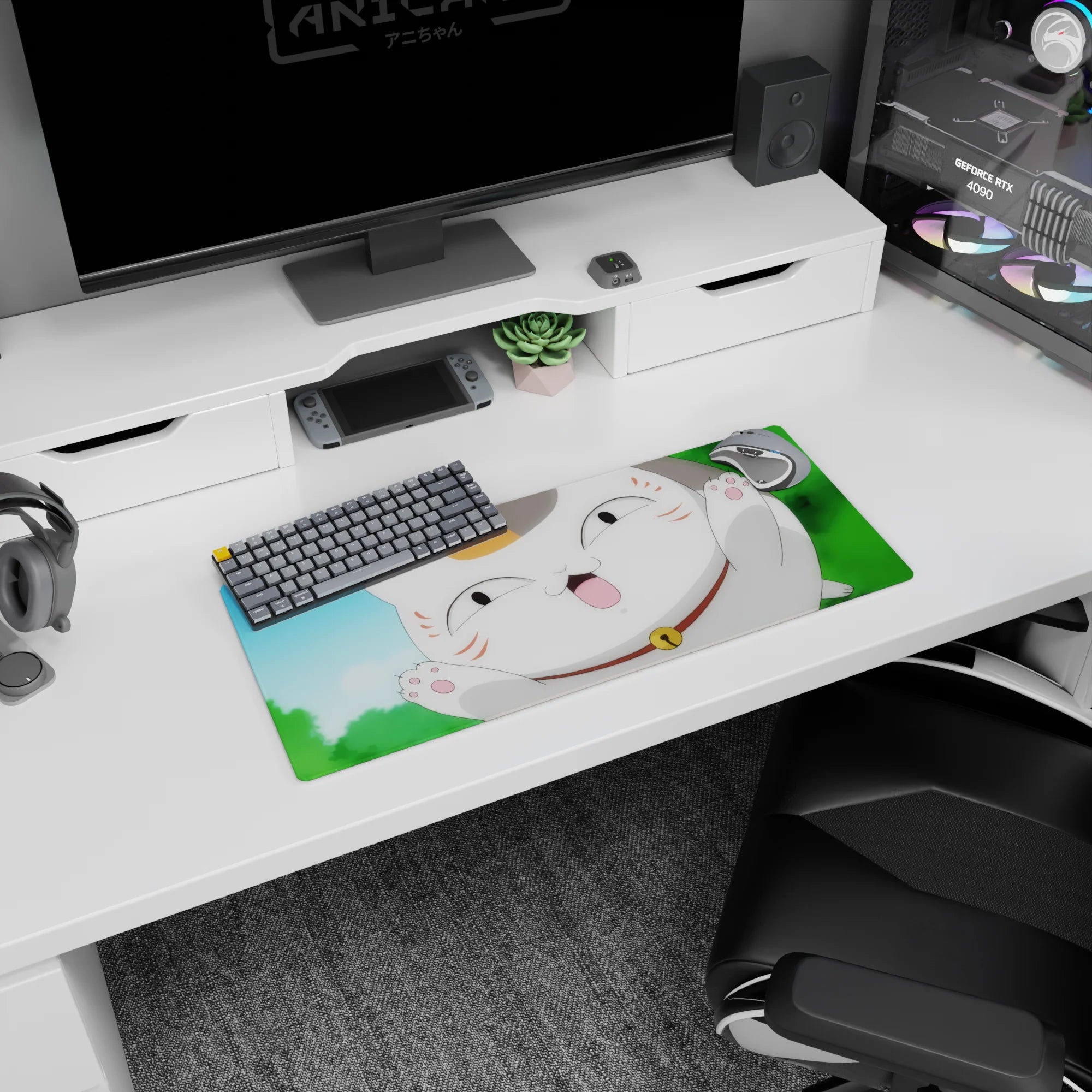 28x12 inches anime mouse pad showing goofy open-mouth maneki-neko popping into frame, paws raised.