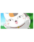 Anime lucky cat close-up mouse pad 32x16 inches with raised paws, bell collar, and goofy grin.