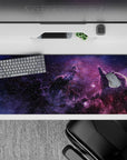 Cozy violet and inky black desk pad 36x16 inches with smoky clouds and a faint rosy glow.