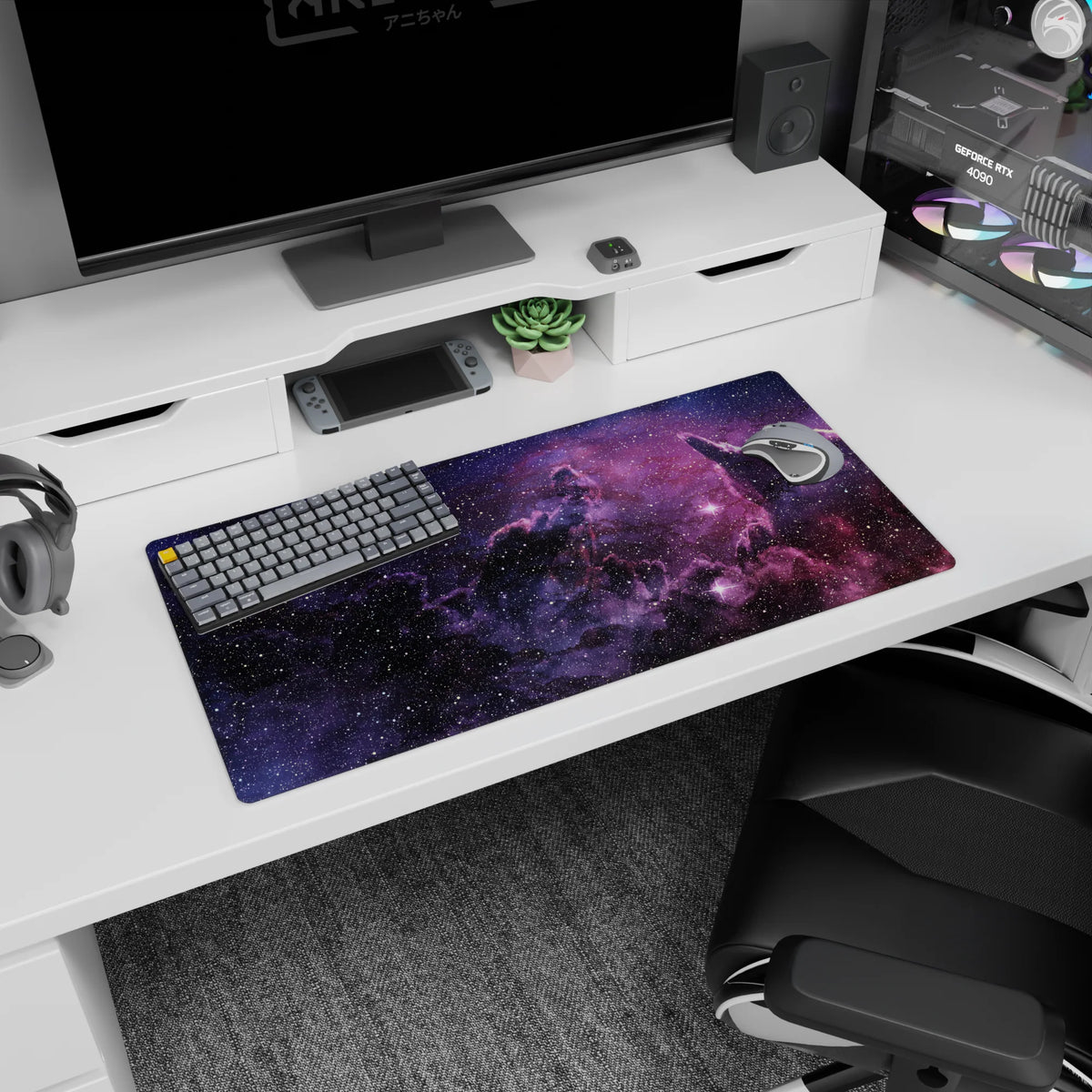 Galaxy scene mouse pad with violet clouds and scattered stars, 32x16 inches.