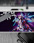 40x20 inches desk pad in moody dark violet with electric cyan glow, gold eyes, and purple ink-like hair.