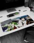 36x16 inches desk pad with wide-eyed anime girl leaning close, flustered cheeks, tiny hair clip by shrine.
