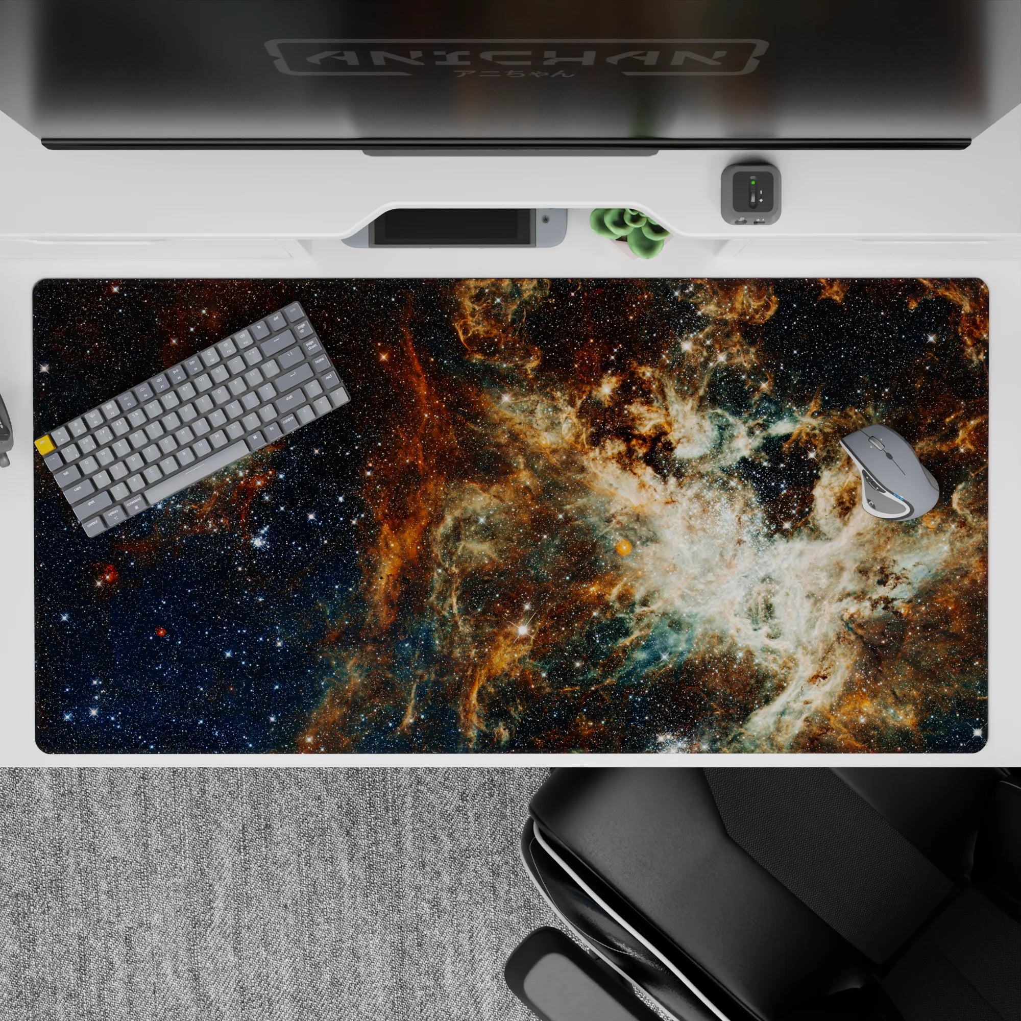 Deep space blue desk pad with warm amber cloud swirls, cozy calm vibe, 40x20 inches.