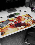 Honey-blonde anime schoolgirl at center desk pad 40x20 inches, shy smile to flustered gasp panels.