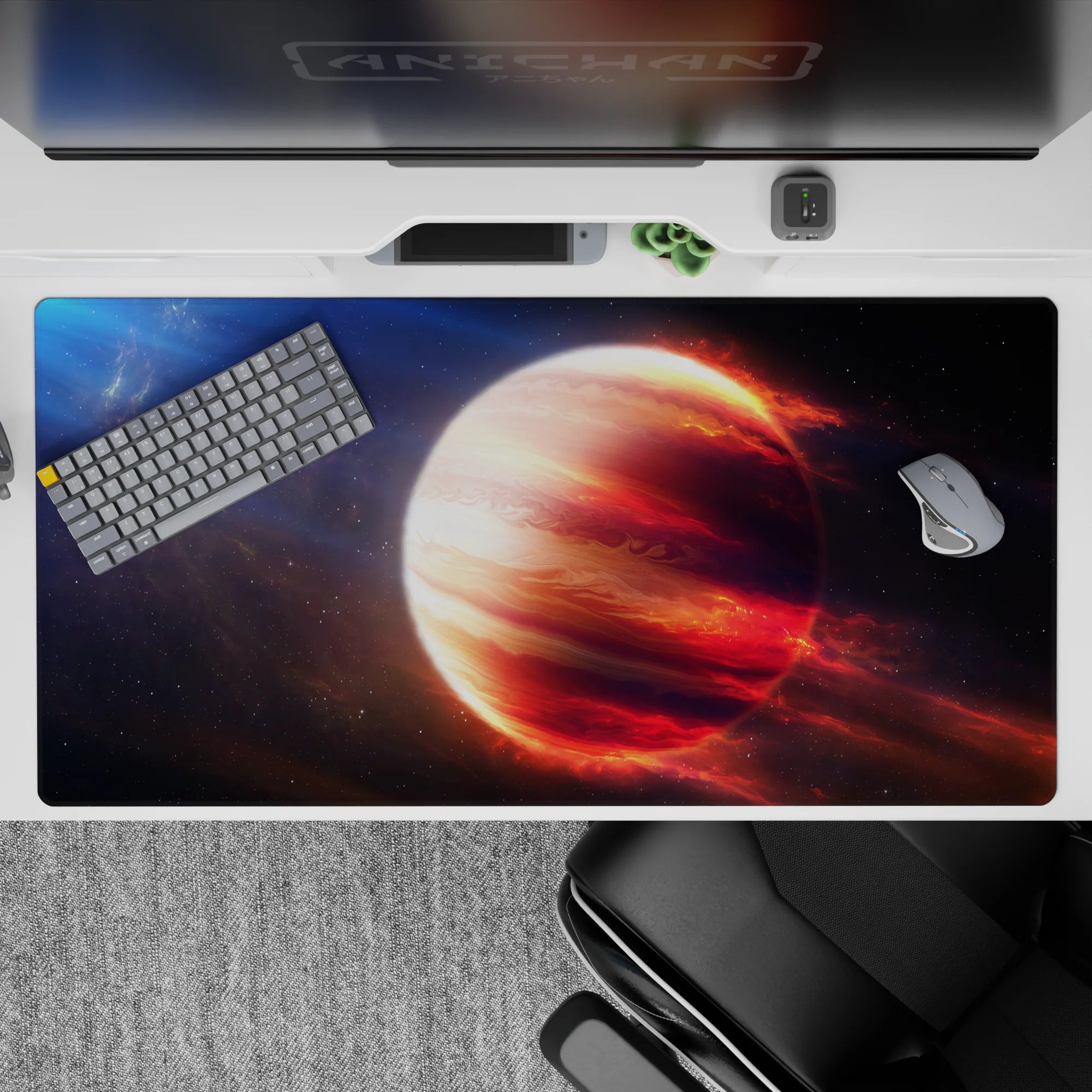 Moody 40x20 inches desk pad in midnight blue and inky black with fiery red-peach comet glow.