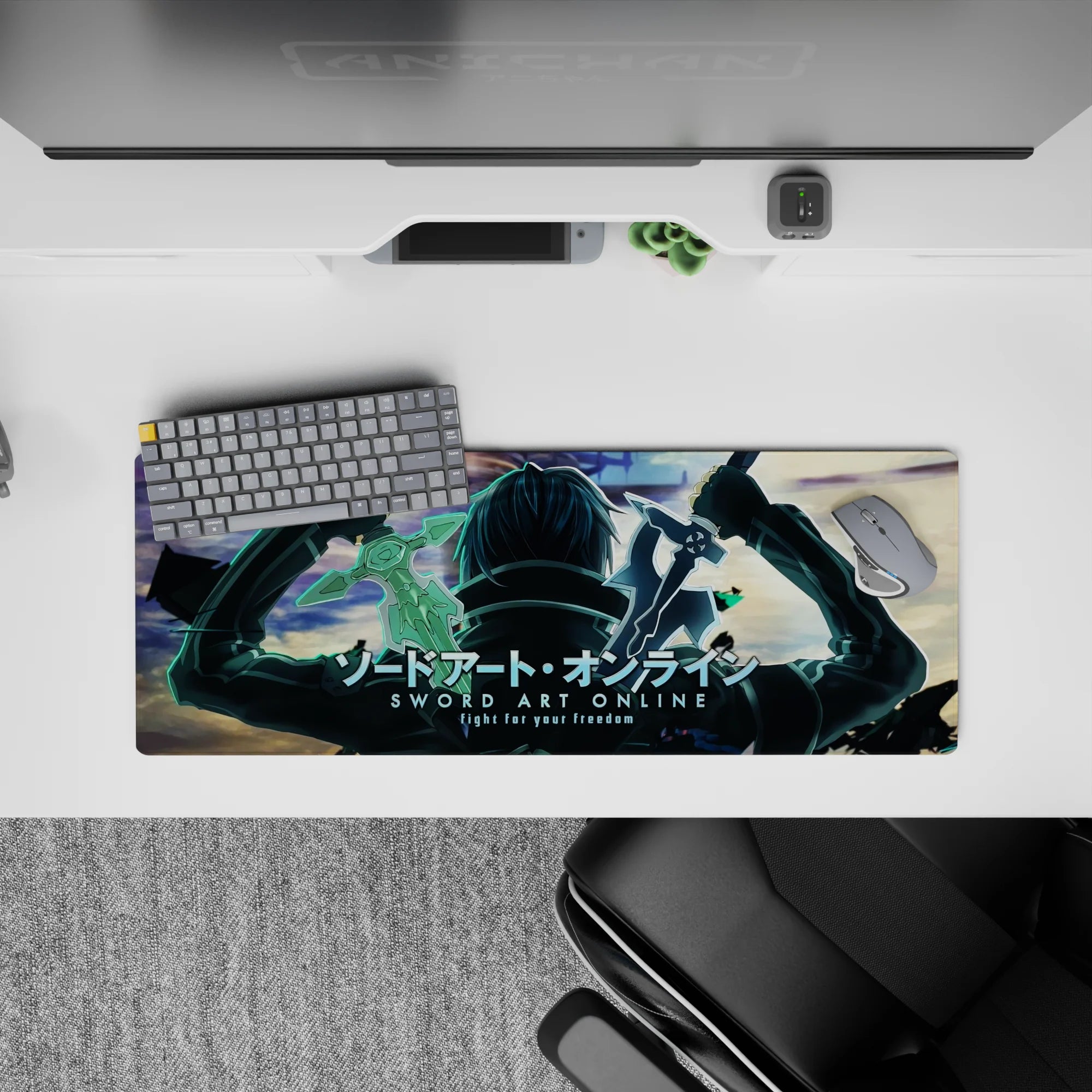 Kirito from Sword Art Online on a 32x12 inch anime mouse pad, featuring a power stance with blades raised against a dramatic sky.