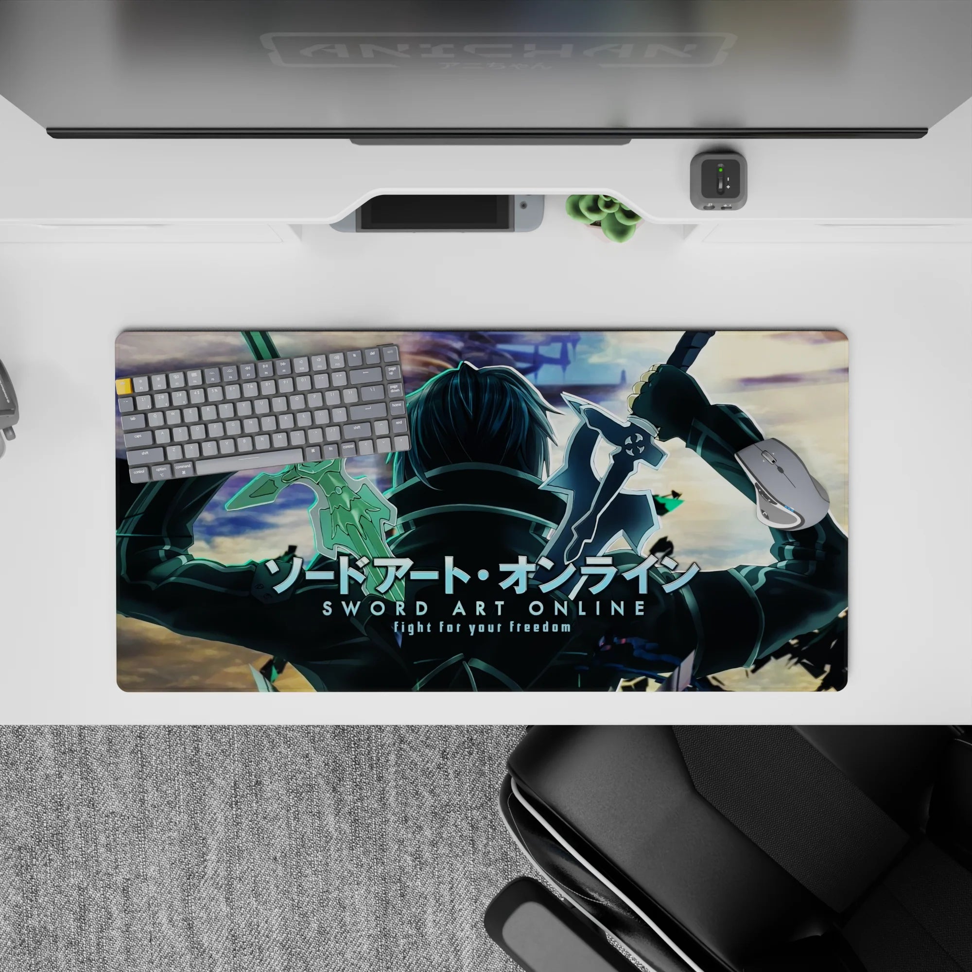 Anime mouse pad 32x16 inches featuring Kirito from Sword Art Online in battle stance, glowing edges, teal shadows.
