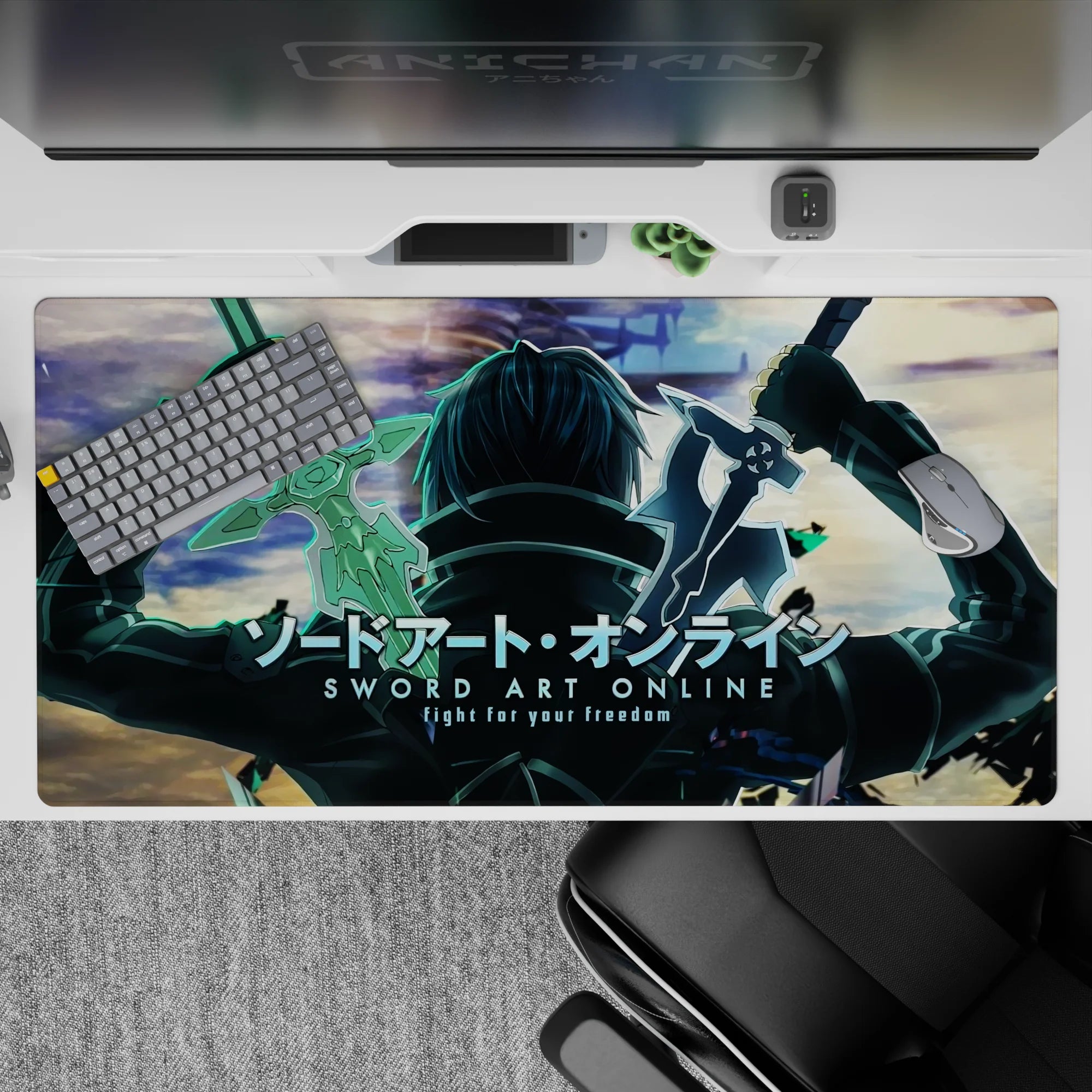 Desk pad featuring Kirito from Sword Art Online, size 40x20 inches, with glowing edges and a dynamic battle theme.