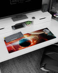 Two planets drifting above a glowing space horizon on extended mouse pad, 32x12 inches.