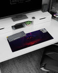 28x12 inches anime mouse pad showing lone torchlit hero facing giant jagged-grin monster in rocky cave.