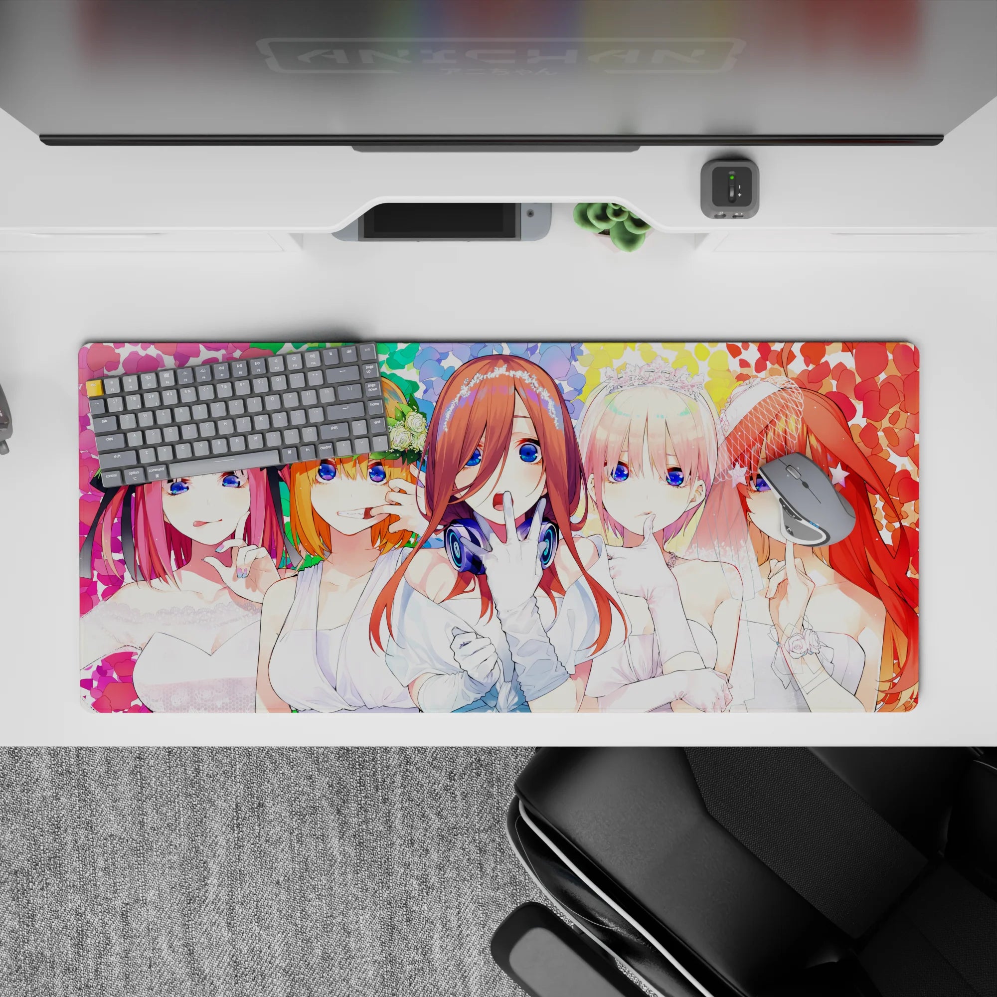 36x16 inches rainbow confetti anime desk pad, bright blue-eyed brides, playful romantic secretive vibe.