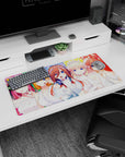 32x16 inches anime girl mouse pad featuring center bride in white with headphones, flanked by pink and orange hair.