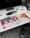 36x16 inches anime desk pad featuring spotlight bride in white with headphones, flanked by pink and orange hair.