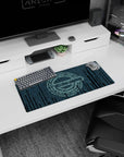 Anime mouse pad 28x12 inches showing an icy teal code cascade shaping a focused face with quiet locked eyes.