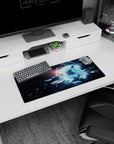 Glowing blue gateway in a star‑dusted void mouse pad 28x12 inches with tiny ships drifting nearby.