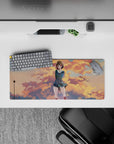 Cozy sunset anime girl mouse pad 28x12 inches in peach-gold and cool blue tones, calming desk vibe.