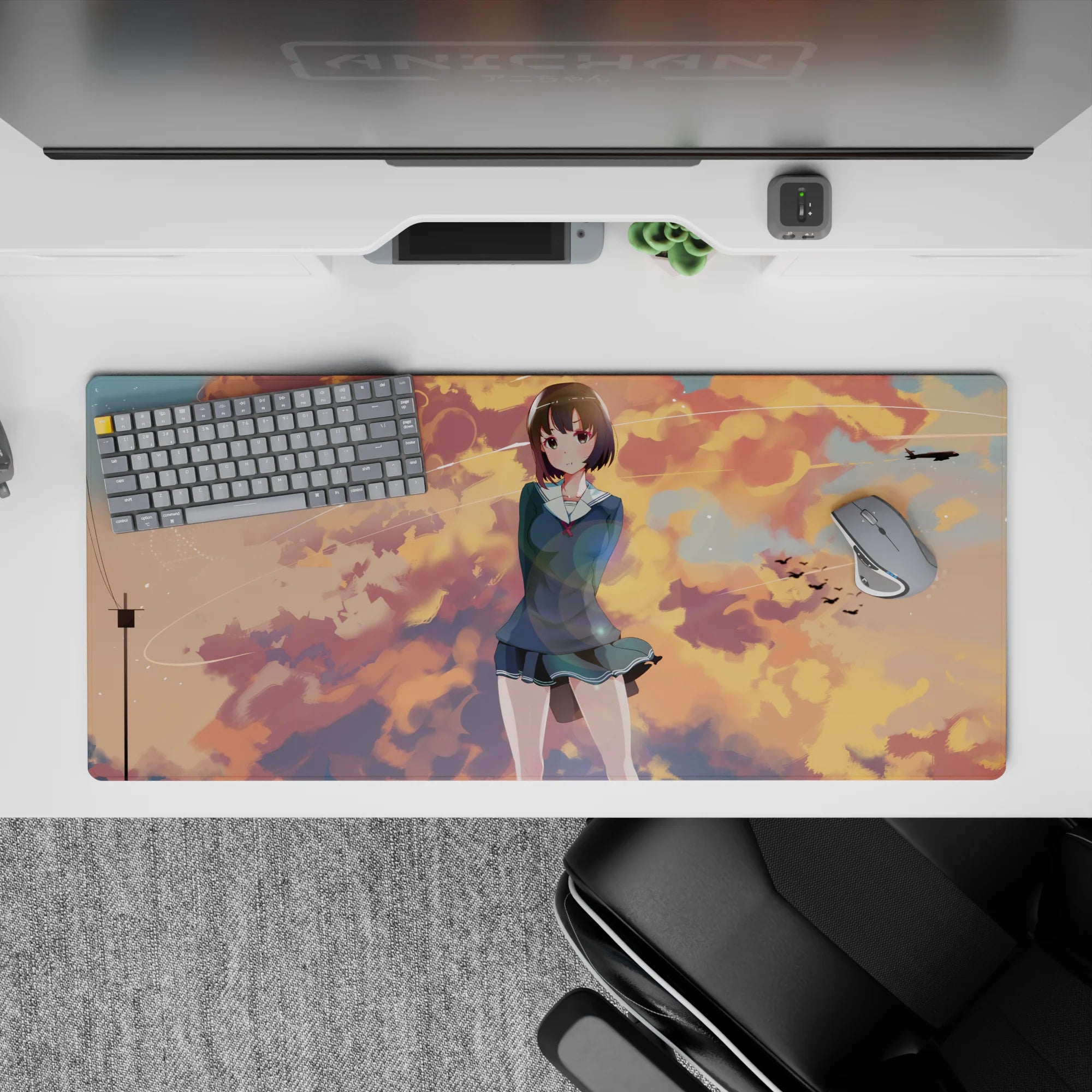 Cozy pastel anime desk pad 36x16 inches in peach and gold sunset tones with cool blue sky trails.