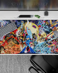 40x20 inches anime desk pad in bold reds, icy blues, and gold sparks with high-energy battle vibe.