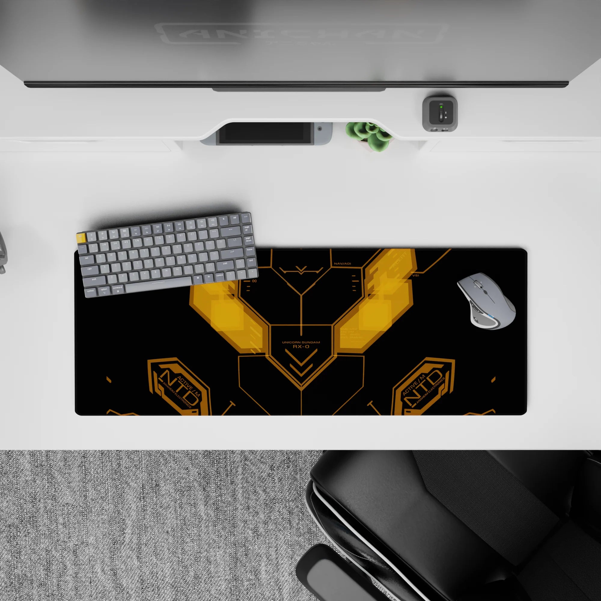 32x12 inches matte black anime mouse pad with hot amber glow lines, sleek techy cozy cockpit vibe.