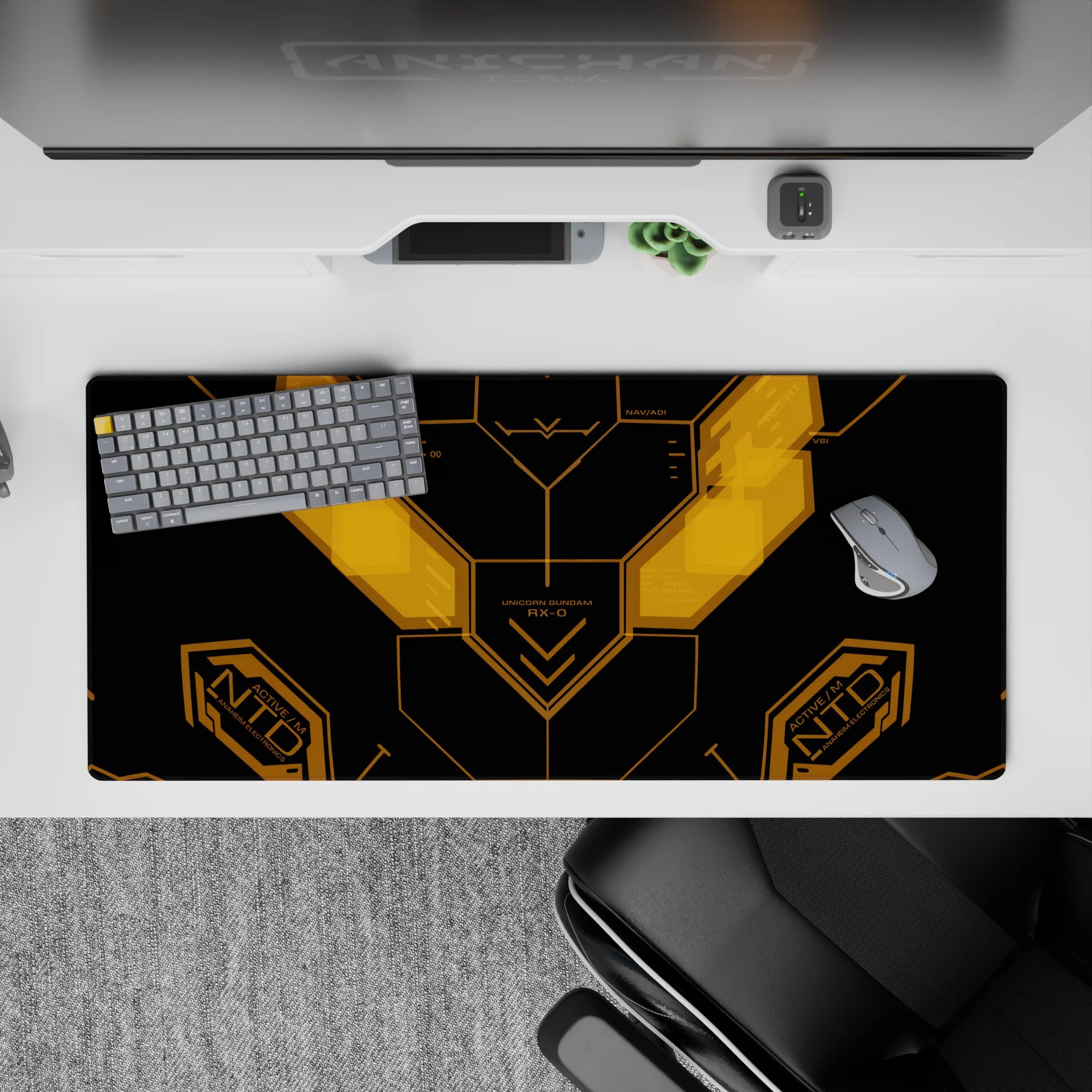 36x16 inches matte black anime desk pad with glowing amber lines, sleek techy vibe, subtle neon glow.