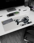 32x16 inches anime mouse pad showing braided fighter midair kicking a spiked armored giant, fists raised.