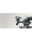 36x16 inches anime desk pad with braided fighter flying kick at spiked armor, crisp motion lines.