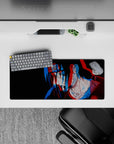 28x12 inches anime mouse pad in trippy red and blue on a black background, dark late-night vibe.