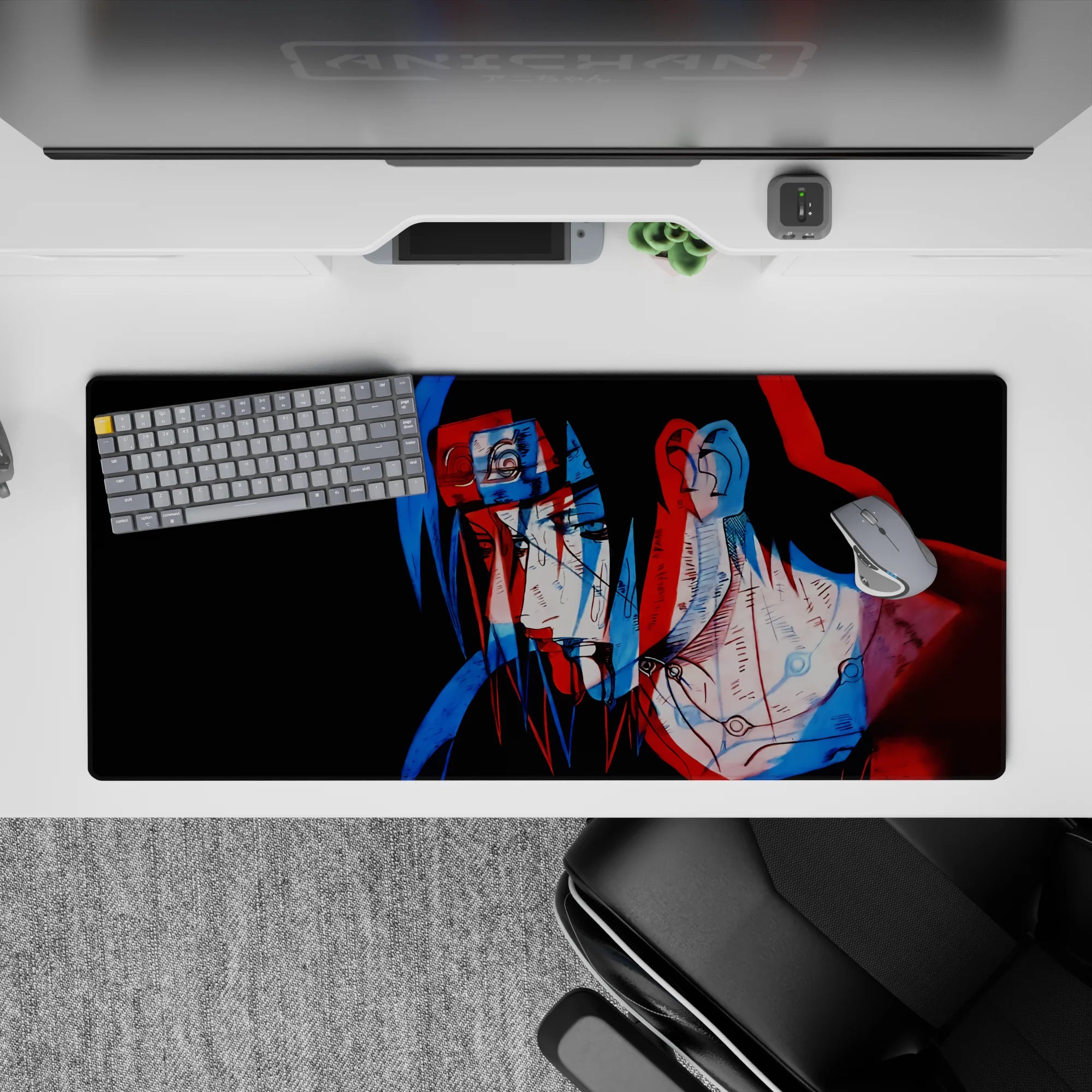 Dark anime desk pad 36x16 inches in moody black with trippy red/blue genjutsu-style shift.