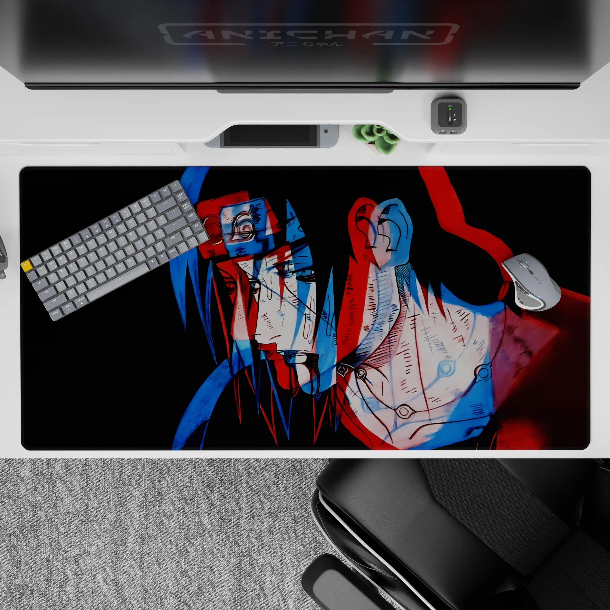 40x20 inches anime desk pad in moody black with trippy red and blue genjutsu-style double image.