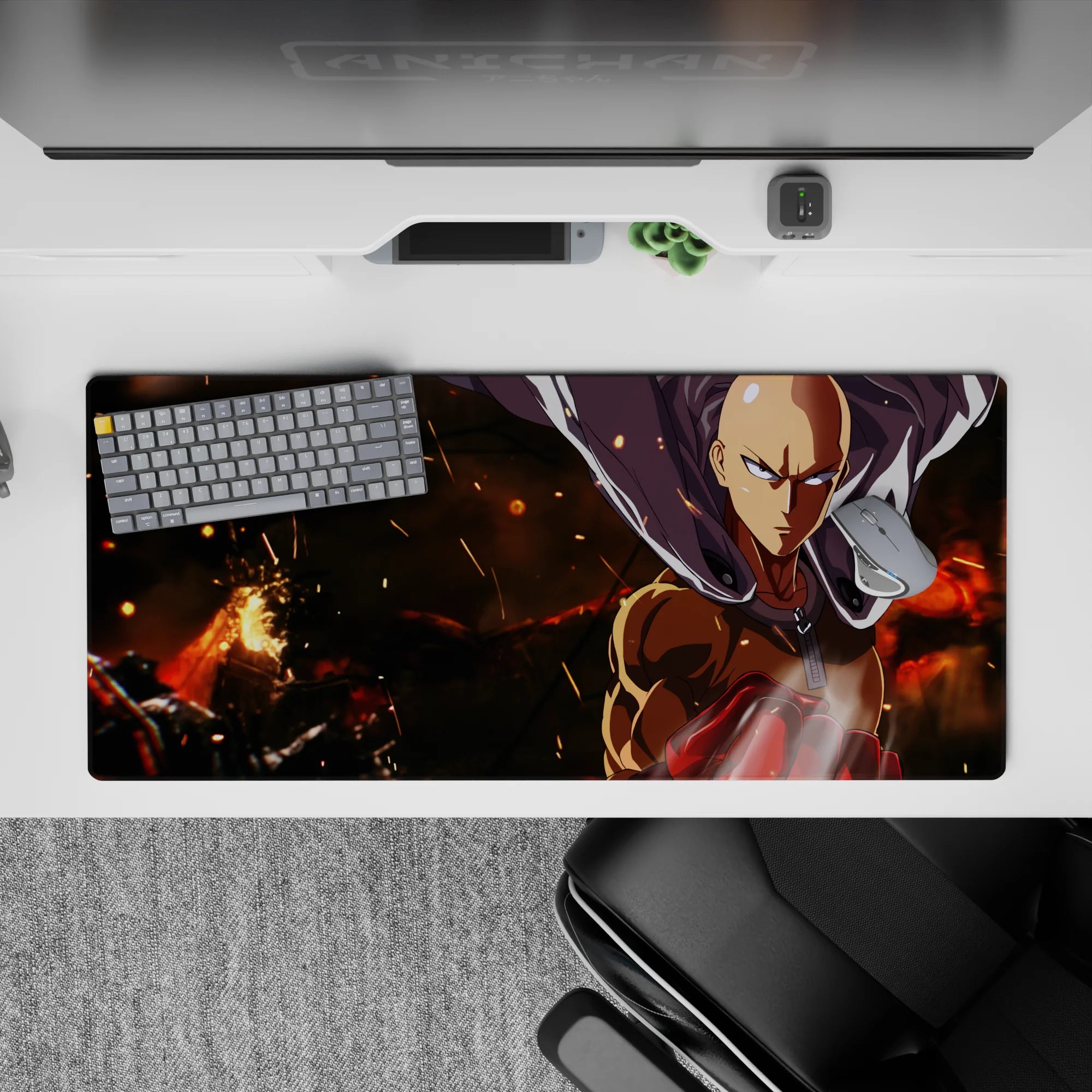 36x16 inches anime desk pad in warm orange glow and deep shadows, smoky fire mood, calm hero focus.