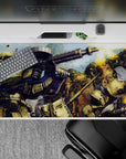 40x20 inches anime desk pad in olive green and stone browns with pink mono-eye glow, gritty war mood.