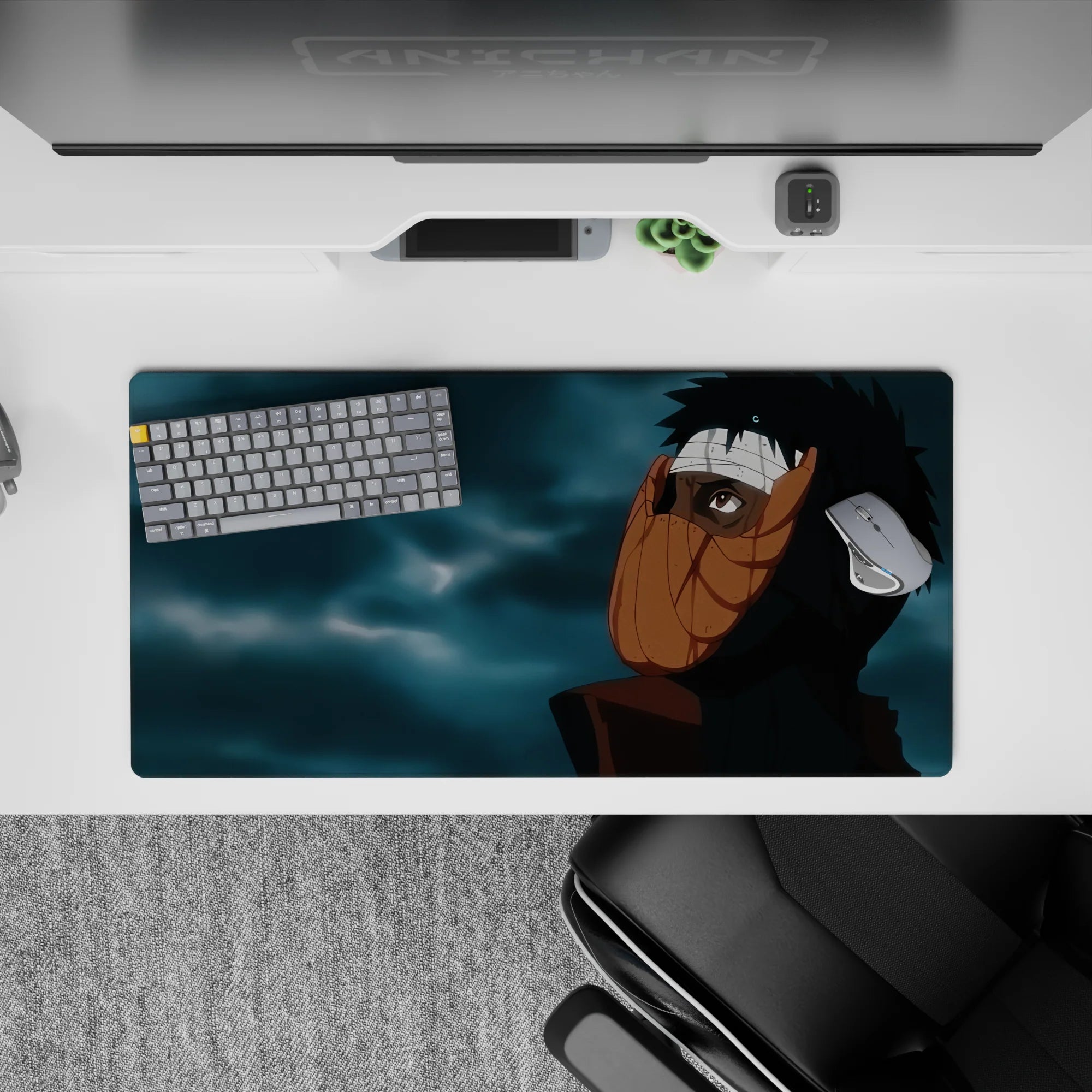 32x16 inches dark anime mouse pad in black and warm orange tones with moody blue-gray clouds.