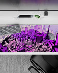 Anime mouse pad 36x16 inches featuring a neon-soaked Tokyo skyline with lavender, magenta, and electric violet hues.