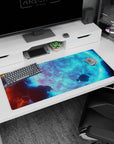 Giant icy-blue moon scene desk pad, 36x16 inches, wrapped in swirling clouds with rocky space drift.