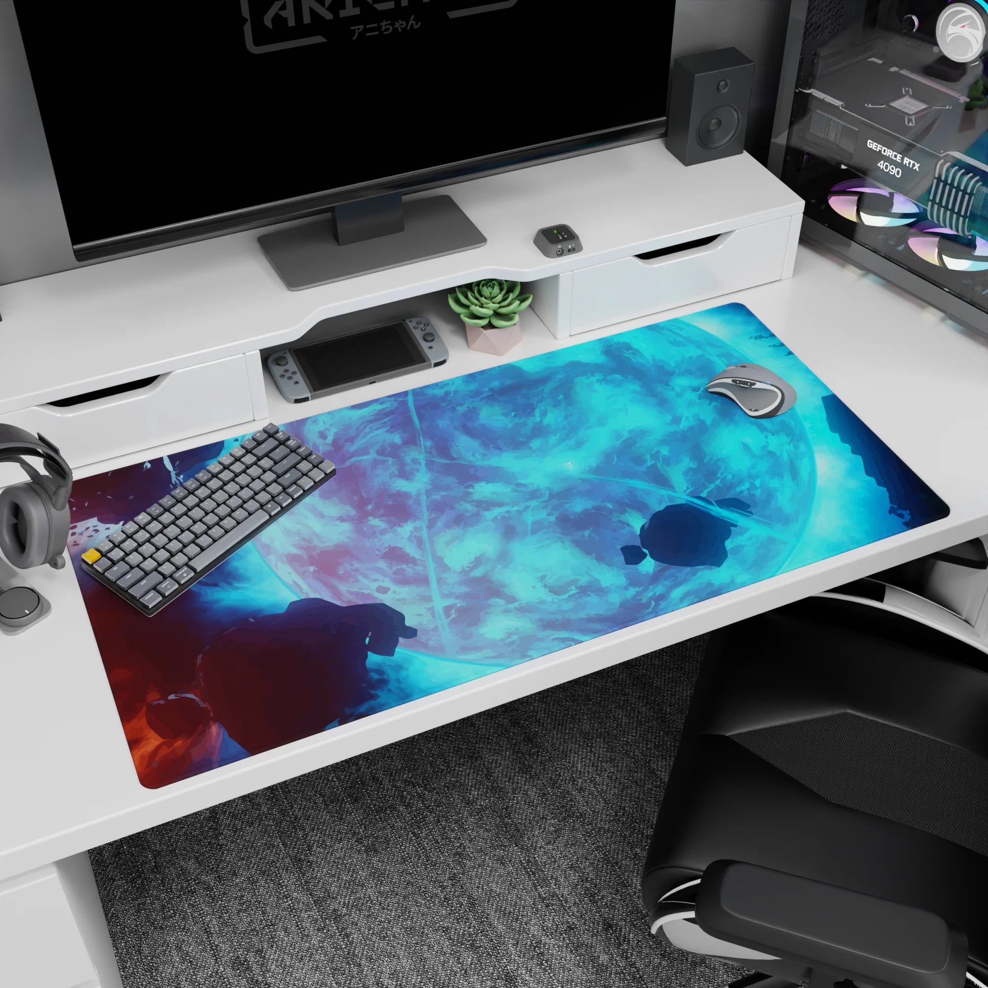 Space scene desk pad featuring an icy-blue moon with floating rocks and cloud bands, 40x20 inches.