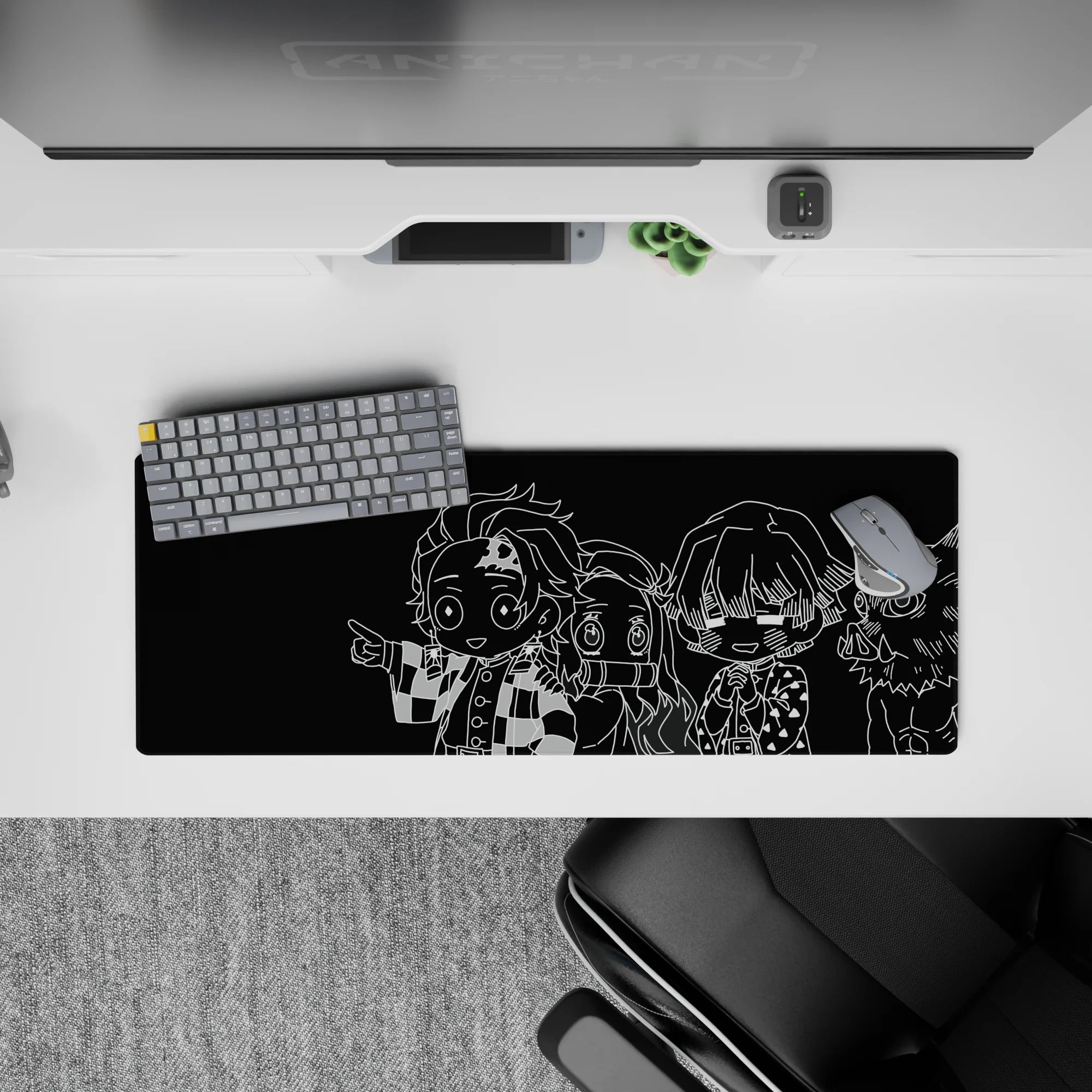 Anime mouse pad featuring chibi characters from Demon Slayer, size 32x12 inches, with bold black-and-white contrasts.