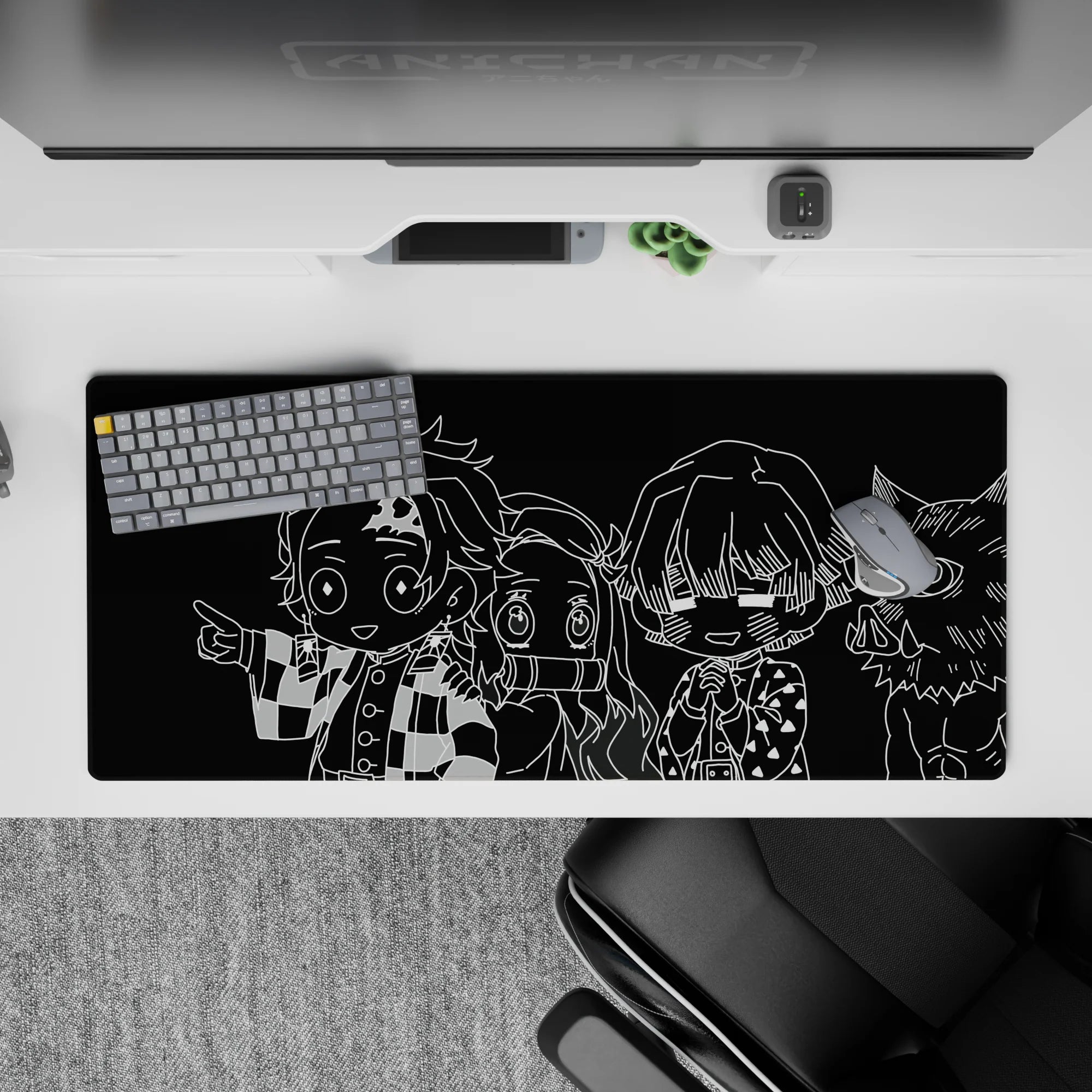 Anime desk pad 36x16 inches featuring monochrome chibi characters from Demon Slayer, bringing energy to your workspace.