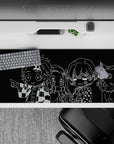 Anime desk pad 36x16 inches featuring monochrome chibi characters from Demon Slayer, bringing energy to your workspace.
