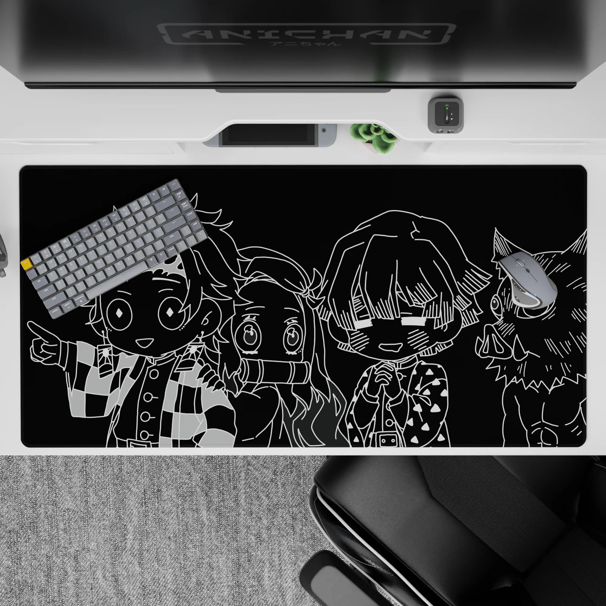 Anime desk pad 40x20 inches featuring monochrome chibi characters from Demon Slayer, offering bold black-and-white contrasts.