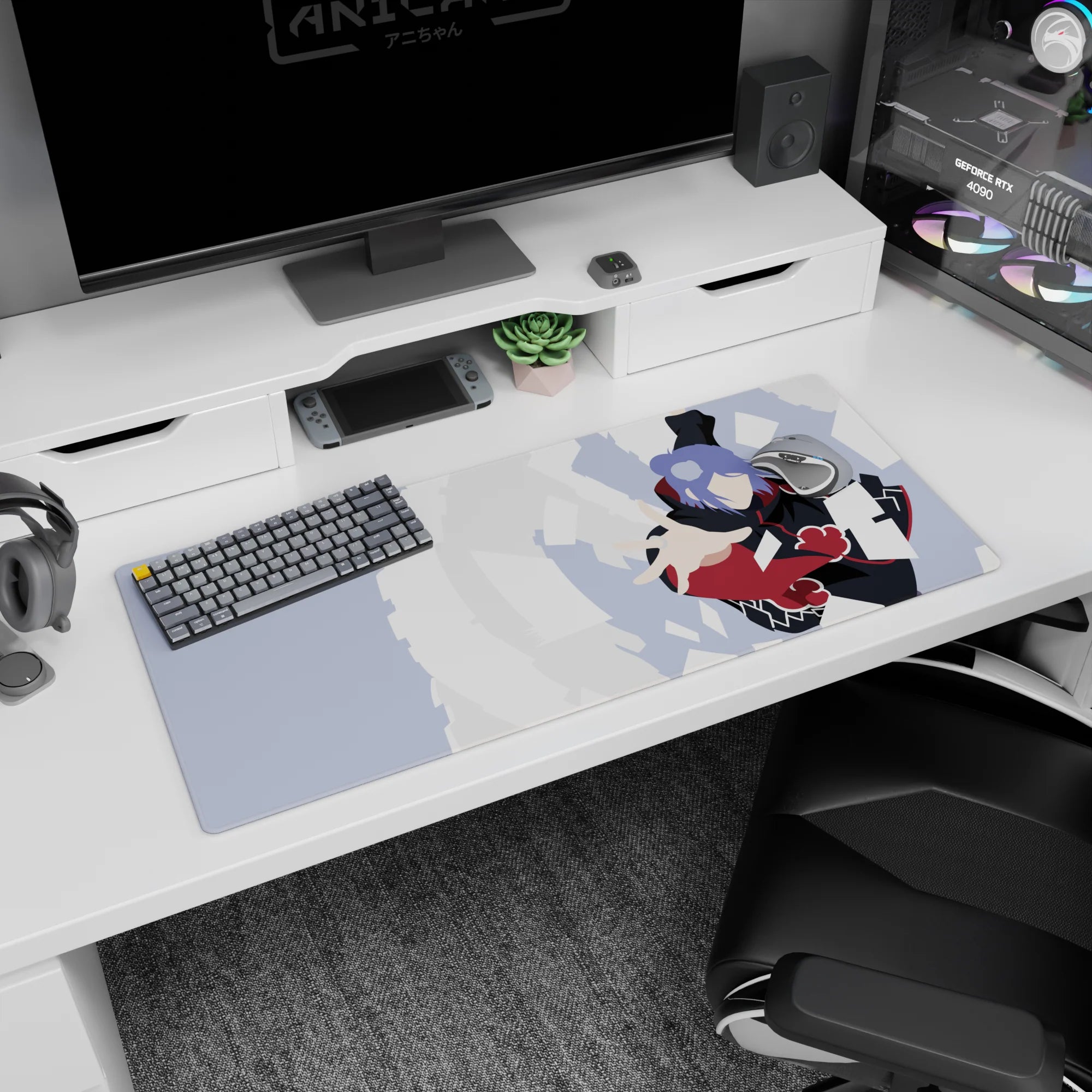 Konan mid-spin tossing white paper shards, Akatsuki cloak, anime desk pad 36x16 inches.