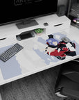 Konan from Naruto Shippuden spinning in an Akatsuki cloak, paper confetti attack on 40x20 inches desk pad.