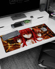 36x16 inches desk pad showing a trio of glossy-eyed redhead catgirls staring forward in quiet tension.