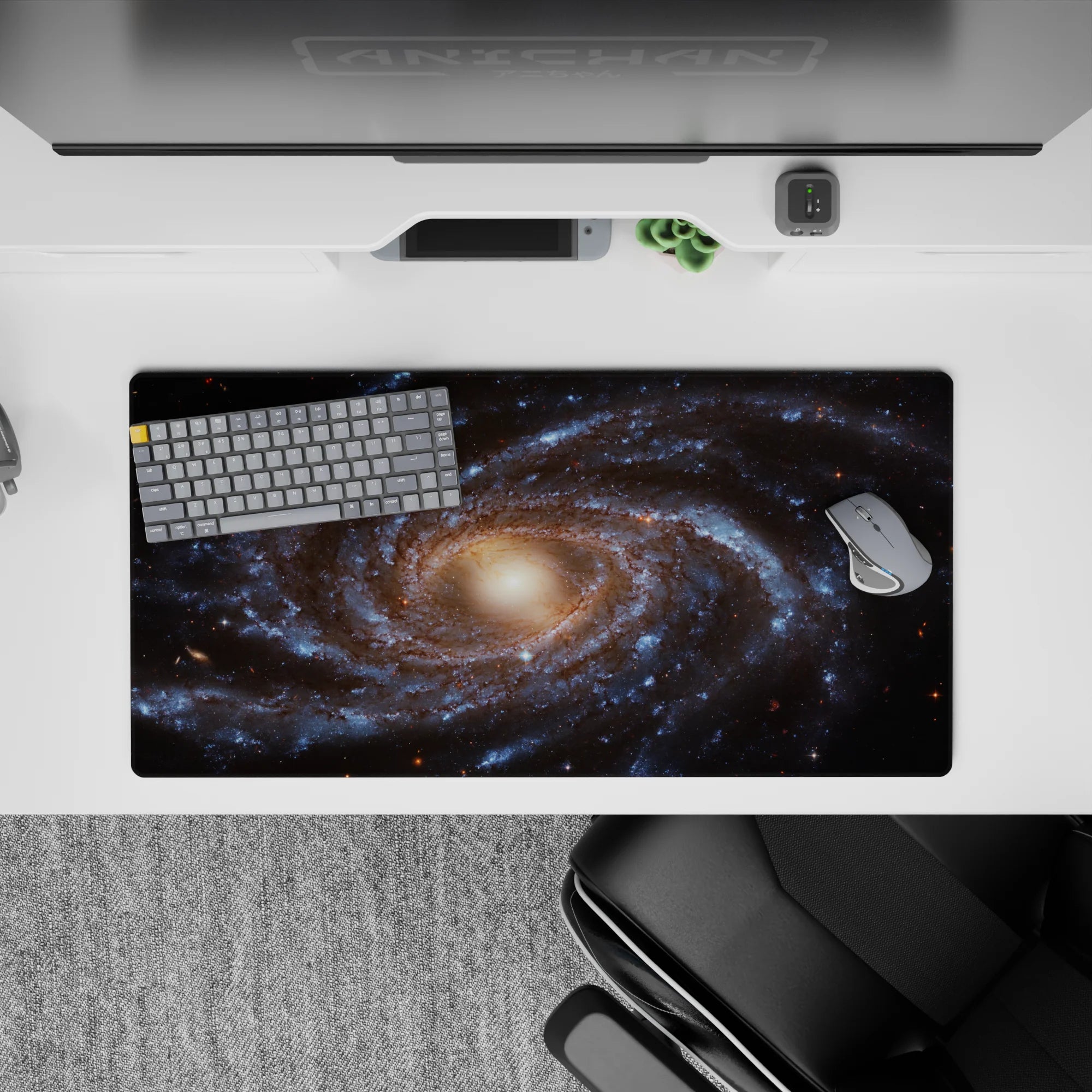 Large 32x16 inch mouse pad featuring a calming spiral galaxy design with smoky blues, golden tones, and starry details.