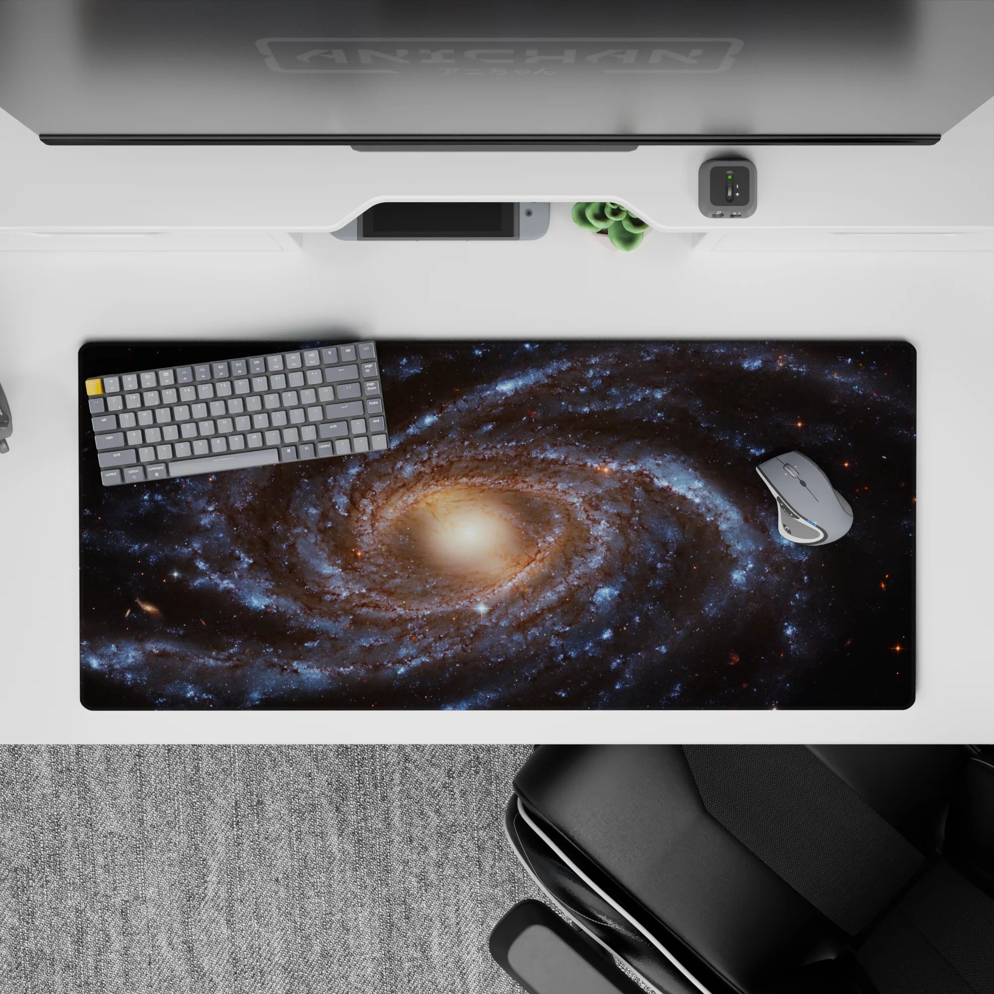 Galaxy themed desk pad 36x16 inches with deep blue and golden tones, smooth surface for work and gaming.