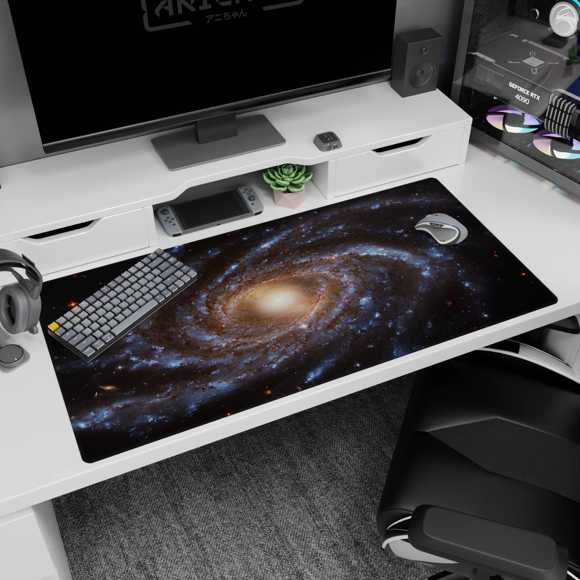 Large 40x20 inch desk pad with a dreamy spiral galaxy design featuring blue, gold, and deep space tones.
