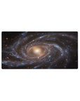 Galaxy themed desk mouse pad 32x16 inches featuring deep space spiral design with smooth vibrant details.