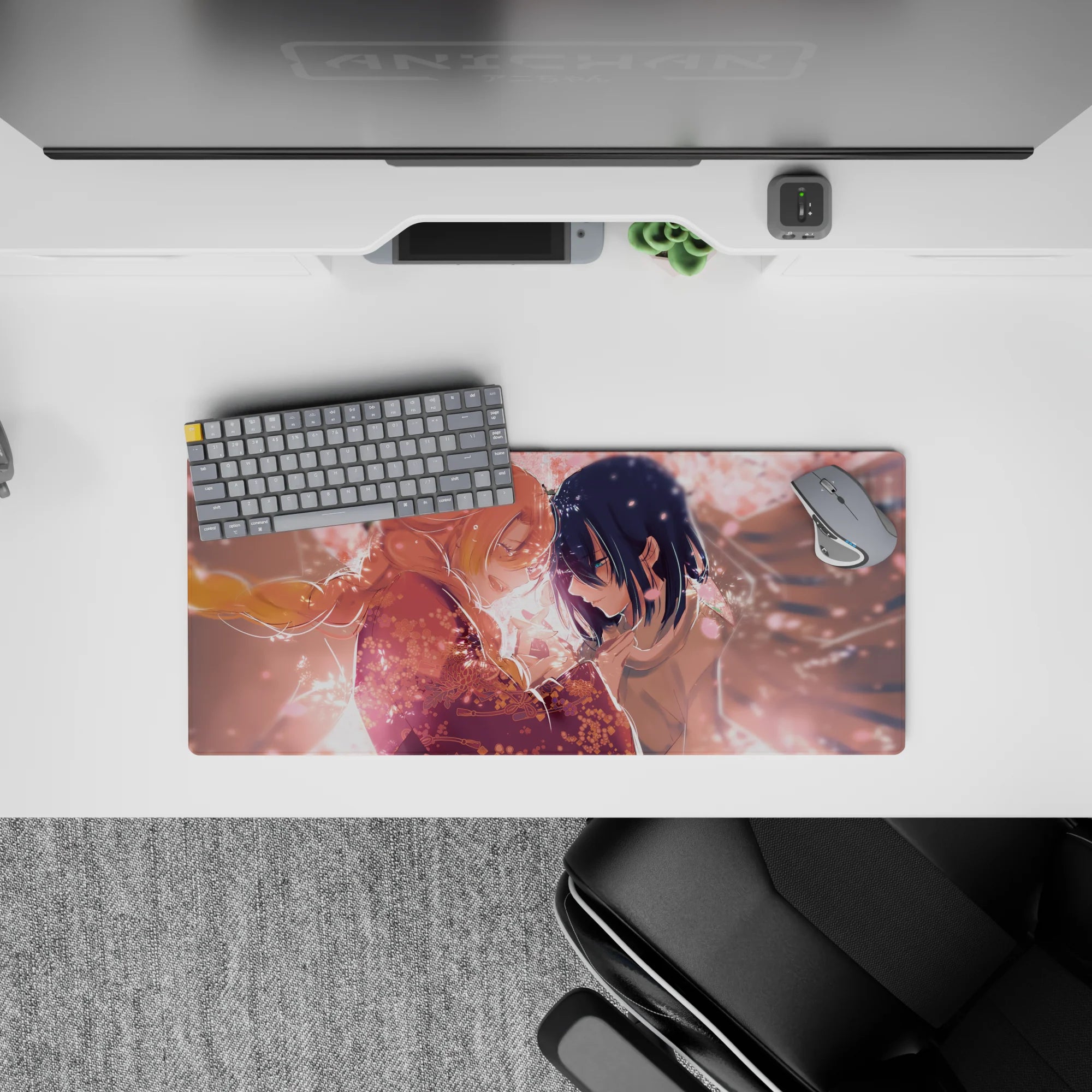 Anime mouse pad 28x12 inches with blush-pink petals, intricate kimono patterns, and sakura lights in a peach sky.