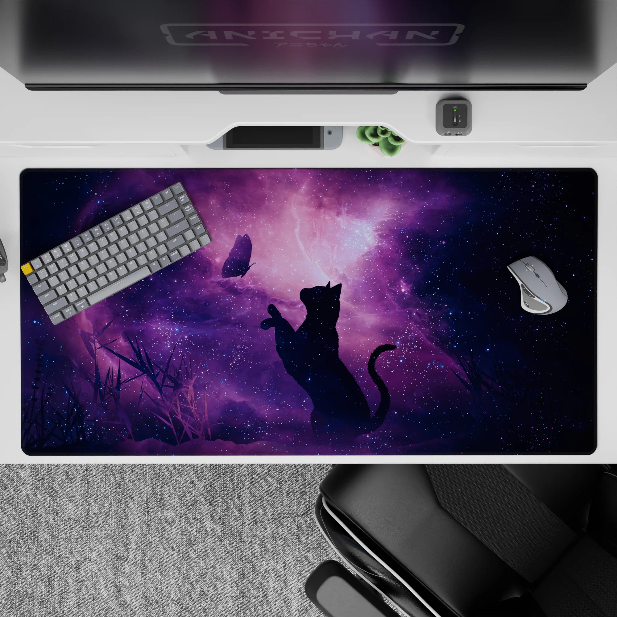 Cozy violet and inky blue nebula desk pad with glittering stars, 40x20 inches.